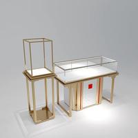 Vitrine murale moderne en or avec éclairage LED pour bijoux, idéale pour les boutiques de luxe, les musées et les salles d'exposition