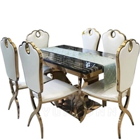 Ensemble de table à manger moderne Offre Spéciale avec plateau en marbre noir et cadre en acier inoxydable doré pour maison, villa, appartement ou hôtel