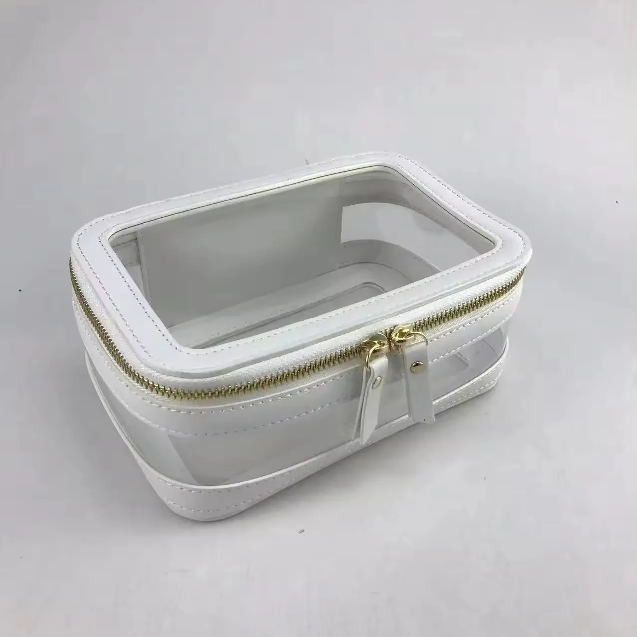 Makyaj aracı ambalaj çantası özelleştirilmiş altın fermuarlar PU deri kozmetik durumda büyük boy temizle PVC kozmetik durumlarda seyahat için