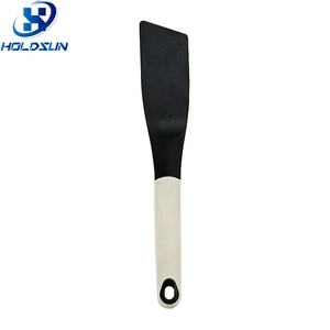 Spatule de cuisine <span class=keywords><strong>étroite</strong></span> en nylon de qualité alimentaire de couleur personnalisée avec manche en caoutchouc ustensile pour la cuisson à la poêle - Product Image 1