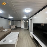 Maison modulaire à deux étages à assemblage rapide, en conteneur, avec structure en acier et fenêtres, bureau sur site personnalisable