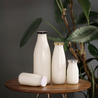 Bouteille de lait de yaourt en verre pasteurisé 200ml 250ml 300ml 500ml 1000ml Bouteilles d'emballage en verre de qualité alimentaire avec bouchon en plastique en aluminium