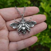 Tendance classique gothique alliage crâne tête Animal papillon insecte série collier boucle d'oreille combinaison costume exquis cadeau pour homme femmes
