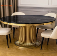 Table à manger ronde de luxe avec plateau en marbre et structure en acier inoxydable brossé doré pour la maison et l'hôtellerie