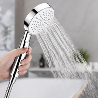 Solution d'installation sanitaire en gros : Douchette ronde portative avec filetage universel G1/2 pour la fourniture aux détaillants et importateurs B2B
