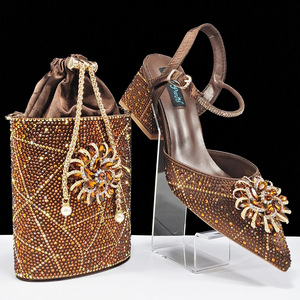A matching set of evening bag <b>shoes</b> <b>with</b> drawstring chains and full-diamond flower-style heels.<b>shoes</b> - Product Image 1