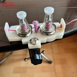 This fine polished alumina ceramic spring reed, a <b>knitting</b> <b>machine</b> part used for yarn tension in the textile industry, - Product Image 3