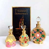 Bouteilles en verre de parfum d'huile essentielle d'Attar d'or en métal de style arabe de Dubaï avec bâton en verre Conception de logo personnalisé 8ml 10ml 12ml 15ml Dubaï