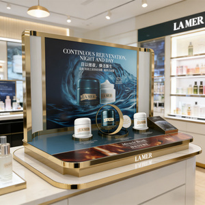 แท่นโชว์ผลิตภัณฑ์บำรุงผิว LA MER แบบอะคริลิกและโลหะสุดหรู พร้อมแผงโฆษณาแบบมีไฟส่องหลัง สำหรับร้านค้าปลีก - Product Image 1