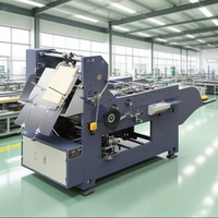 Machine automatique multifonctionnelle pour l'emballage de petits articles en papier et la fabrication d'enveloppes