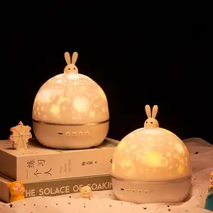 儿童礼品婴儿房夜灯兔子发光二极管动画装饰灯充电音乐盒星空投影仪夜灯