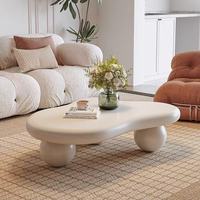 Table basse en forme de nuage irrégulière avec pieds sphériques, style moderne minimaliste, table de décoration rustique pour salon