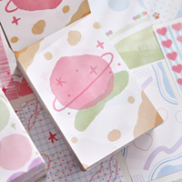Un paquet de papier artisanal coloré M5, briques de papier perforées, papier de fond coloré pour bullet journals et notes autocollantes