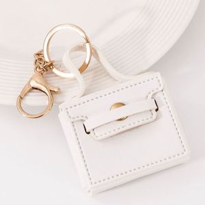Mini sac à main porte-clés de luxe en cuir PU, couleur bonbon, portable, avec pendentif, porte-monnaie et étui pour écouteurs, cadeau promotionnel - Product Image 2