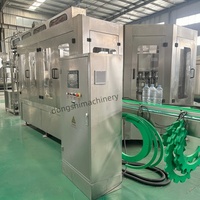 Machine de remplissage et de scellage de bouteilles en verre électrique avec pompe 220V 2000BPH pour l'embouteillage de jus et de boissons lactées