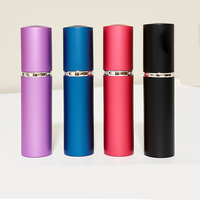 Flacon de parfum portable cylindrique en ABS de 10 ml, emballé en carton, conteneur vide pour maquillage, vente en gros personnalisée pour les boutiques en ligne américaines