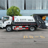 Camion à ordures compacté à énergie nouvelle, alimenté par batterie, SHACMAN 4*2, fabriqué en Chine.