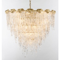 Lustre en verre artisanal doré de grande taille, élégant luminaire de plafond à cascade pour salon de luxe