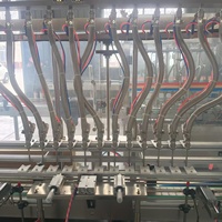 Machine de remplissage linéaire à 12 têtes à gravité pour bouteilles PET et en verre, idéale pour la sauce soja et le vinaigre blanc