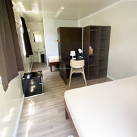 Maison conteneur préfabriquée moderne de luxe à montage rapide de 20 pieds pour bureau à domicile avec mobilier et salle de bain