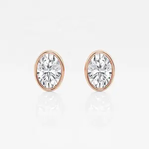 Oval Lab Diamond Bezel Stud Earrings lab-grown oval-shaped diamond earrings in 14k white gold bezels.