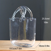 Vase en verre soufflé à la main Bixuan avec un design inspiré du sac à main, poignées cintrées et arrangements floraux pour la décoration de mariage et de la maison