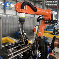 Sel Las MIG Robotik 6-Axis dengan Posisioner Sumbu Tunggal Ganda & Jig Pneumatik Khusus untuk Pengelasan Rangka Kursi Otomatis