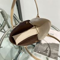 Sac à main vintage unique imprimé pour le dropshipping, sac seau tendance bicolore avec bandoulière et poche pour téléphone/portefeuille
