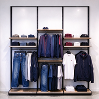 Portant à vêtements pour magasin, noir, avec poteaux à fentes, étagère en bois, rail de suspension, table de présentation ronde, CE ETL, vente en gros
