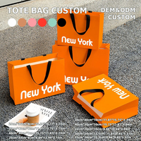 Bolsa de Papel Blanca Personalizada al por Mayor con Asa de Lámina Dorada y Laminación Mate para Boutique de Ropa y Empaque de Compras