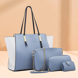 Conjunto de bolsos de mano de piel sintética 4 en 1 para mujer, bolso grande con bloques de color, bolso cruzado, tarjetero y monedero. - Product Image 1