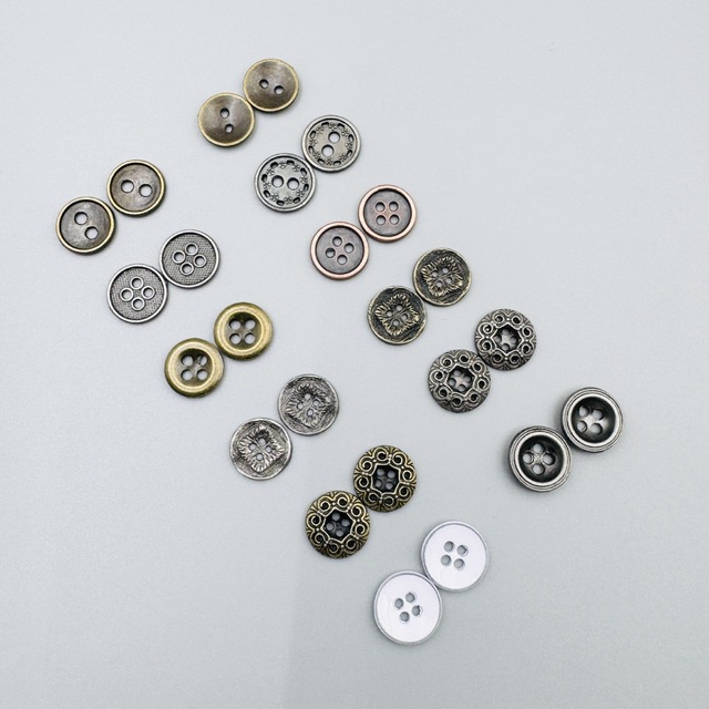 Whole Sale Popular Custom logo 11mm 18L Metal Alloy 2/4 Holes Button Round Sewing Metal 4 Holes Button for Clothing