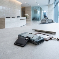 Hochleistungs-Smart-Security-Token für den Zugang zu Gewerbegebäude-Türen: RFID-Leder-Schlüsselanhänger-Karte