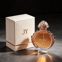 Flacon de parfum rond en verre de luxe avec pompe pulvérisatrice 30ml 70ml 100ml, boîte d'emballage personnalisée avec logo imprimé pour marque de parfum