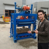Nouvelle machine à blocs creux en béton, machine à briques autobloquantes, découpe et moulage manuels, 380V/220V, facile à utiliser, garantie 1 an