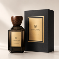 Flacon de parfum de luxe en verre de 100 ml avec bouchon en bois, étiquette métallique personnalisée et emballage cadeau haut de gamme