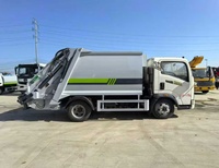 Camion benne à ordures compacte SINOTRUK 4*2 6CBM à chargement arrière, diesel, manuel, à vendre en Chine