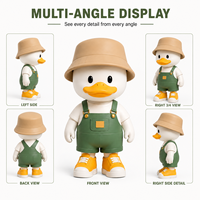 Figurine Mascotte Personnalisée en PVC Imprimée Directement de l'Usine, Figurine d'Animal Mignonne en Salopette Verte, Fournisseur de Jouets Décoratifs