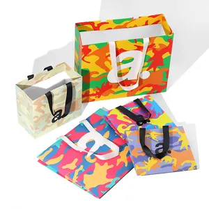 Wholesale Luxury Custom Printed Kraft Handle Paper Bag Recyclable Retail Packaging bag for Clothing Underwear Socks Brand Logo