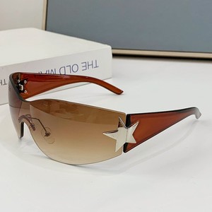 Gafas de sol Fashion Shield con lentes degradados UV400 para mujer, diseño de estrella sin montura, protección solar para adultos - Product Image 1