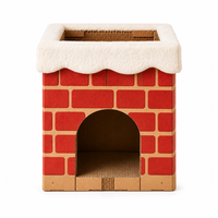 Maison pour chat en carton ondulé avec cheminée, cachette et griffoir, décorée de motifs neige et briques