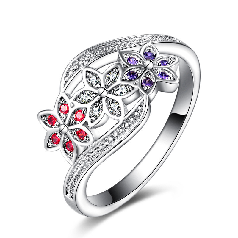 Red and blue colored gemstone ring