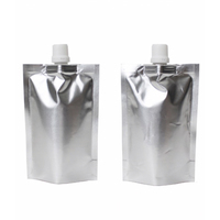 Vente en gros de sachets en aluminium personnalisés de 50ml 100ml 250ml avec bec verseur pour cosmétiques et liquides alimentaires
