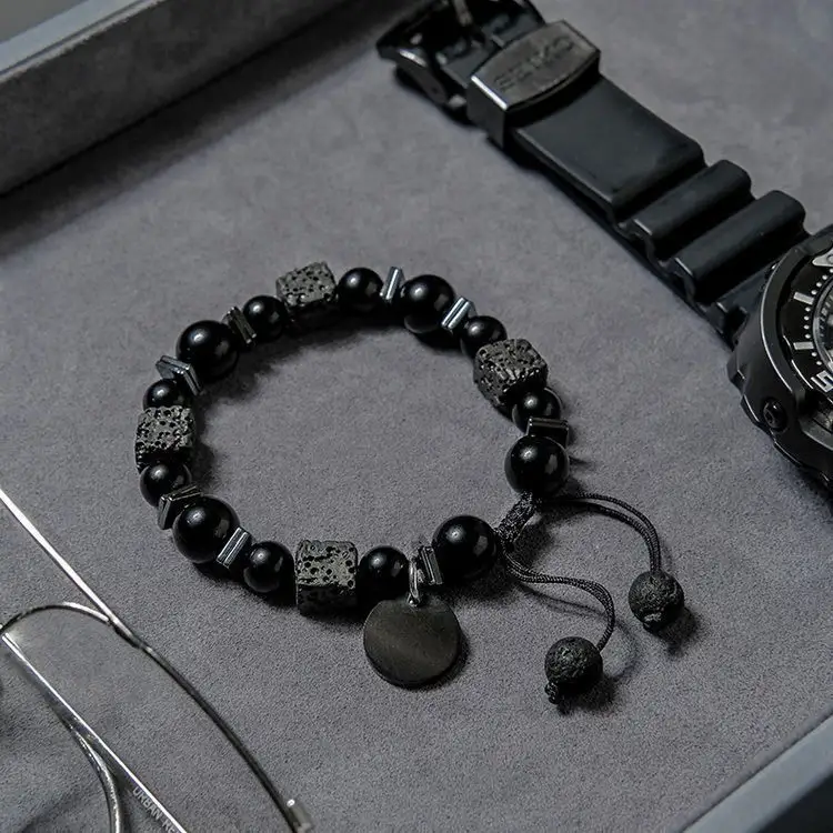 YICAI Bracelet de perles de pierre naturelle de roche de lave noire de 8MM pour homme Bracelet tissé de bloc de lave perlé réglable