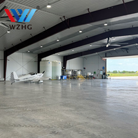 Hangars d'avions en acier sur mesure pour avions d'entreprise, structure assemblée avec finition anti-corrosion pour une longue durée de vie