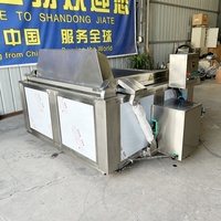 Chaudière industrielle à cuve unique à chaleur thermique en nid d'abeille avec déchargement automatique du panier par basculement pour la production de viande de bœuf, de porc et de poulet