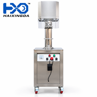 Machine de capsulage semi-automatique pour canettes en aluminium avec tête de scellage simple et cabinet en acier inoxydable pour jus
