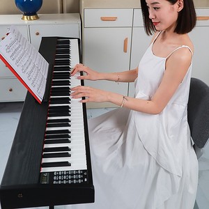 Piano digital de 88 teclas contrapesadas con teclado de madera y 16 polifonías para uso doméstico - Product Image 1