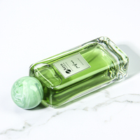 Nouveau style de flacon de parfum de luxe vide en verre de 100 ml avec pulvérisateur mat et boîte pour bouchon