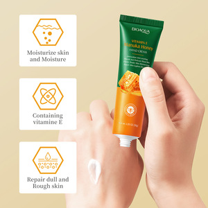 Crème pour les mains au <span class=keywords><strong>miel</strong></span> <span class=keywords><strong>de</strong></span> <span class=keywords><strong>Manuka</strong></span> et à la vitamine E 30g OEM Anti-fissures Hydratante Nourrissante Répare les peaux sèches et rugueuses - Product Image 3